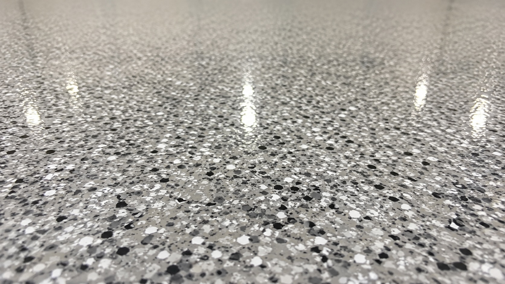 Gray epoxy floor coating with flake chip system in a St. George Utah garage